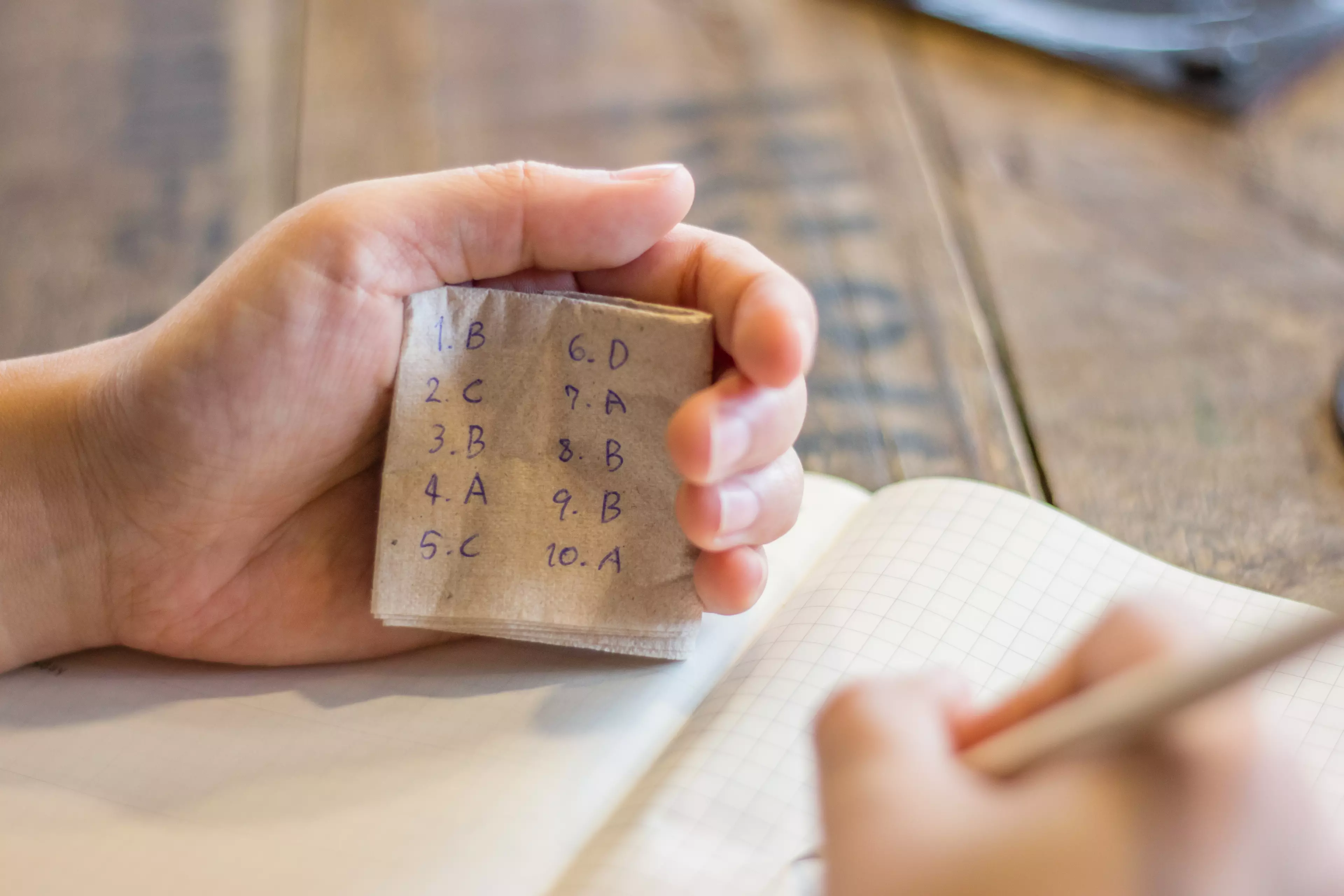 Test cheating with cheat sheet hidden in the hand